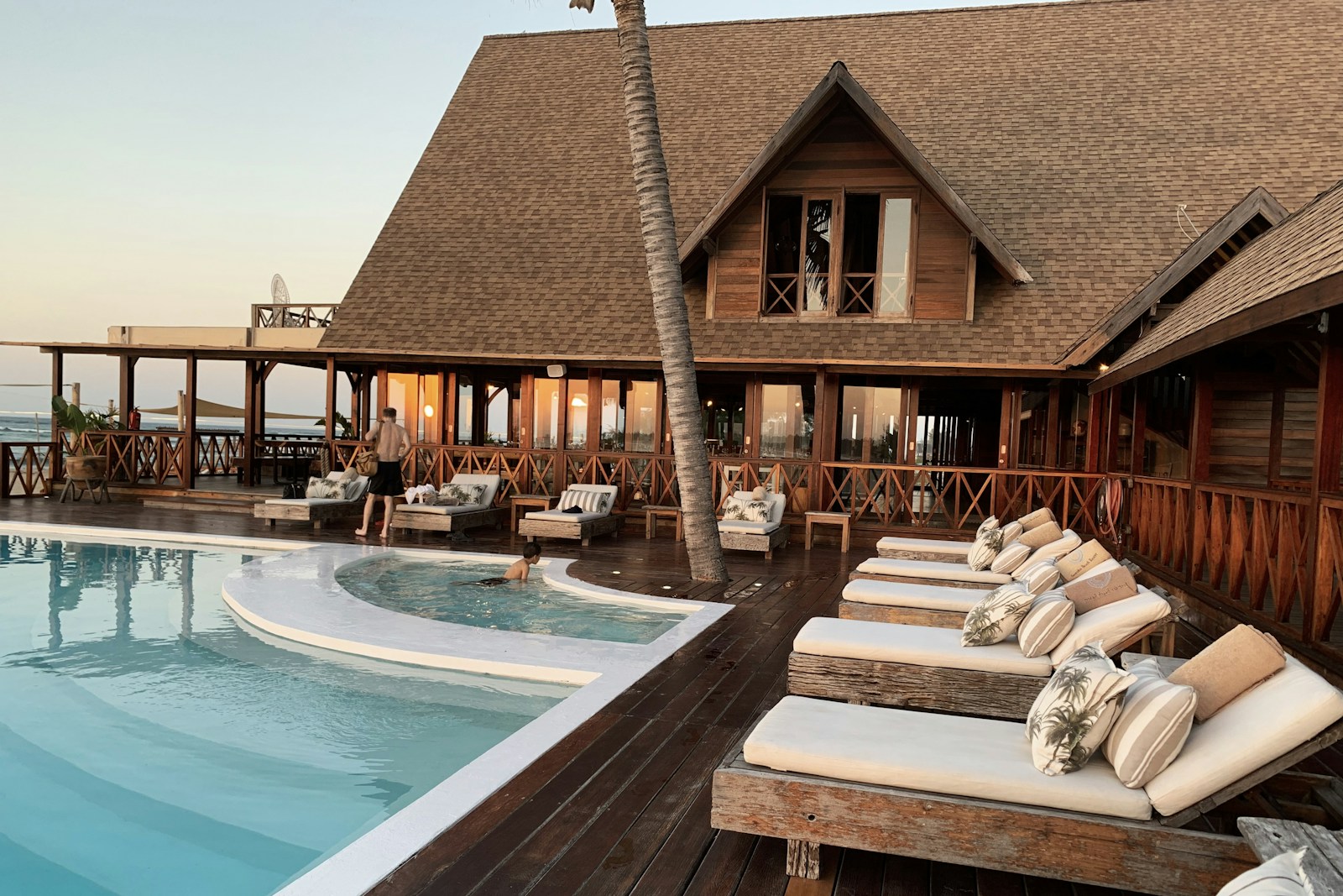 A tropical hotel beside a pool